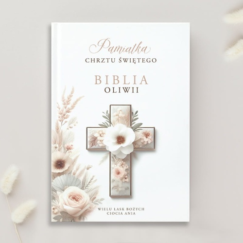 Personalizowana biblia exclusive z krzyżem na okładce i motywem kwiatowym. Idealny pomysł na praktyczny na Chrzest Święty dziecka.