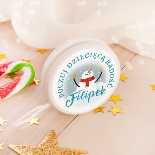 Świąteczne jojo z napisem „Poczuj dziecięcą radość” i imieniem dziecka.