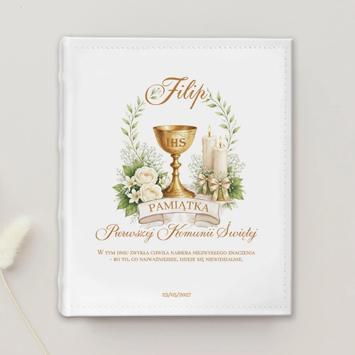 Komunijny album na zdjęcia z imieniem Filip i grafiką kielicha IHS