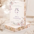 Biblia komunijna z motywem krzyża i personalizacją. Wydanie z kolorowymi i barwionymi brzegami.