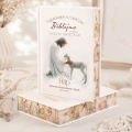 Biblia personalizowana ze zdobionymi brzegami.